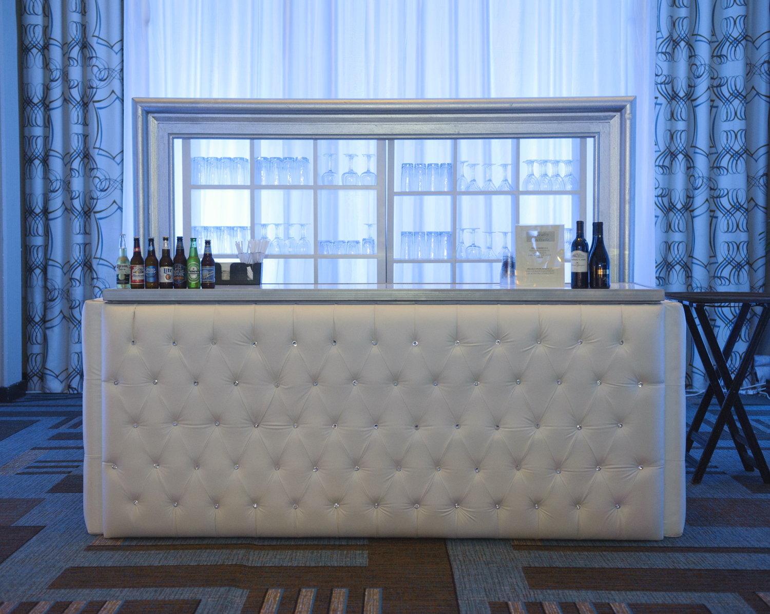 leather tufted bar